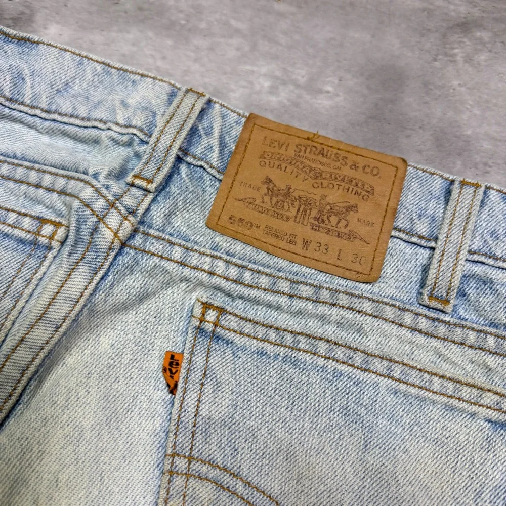 Vintage Levis 550 Orange Tab Relaxed Fit Tapered Leg Light Wash Jeans 33x30